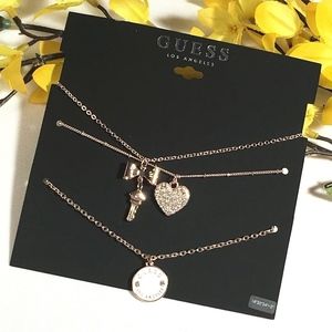 𝅺3/$29! GUESS Layered Necklace Heart & Bow Gold